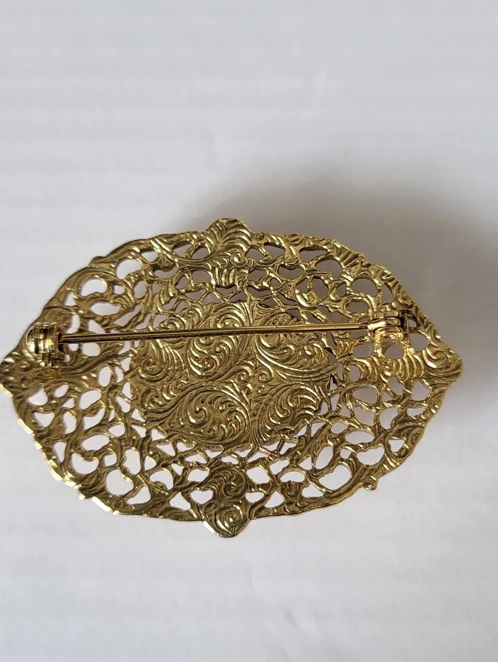 Vintage 1928 Brand Cloisonne Goldtone Filigree Floral Brooch with Pink Accents
